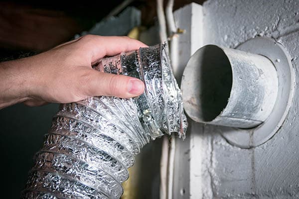 Dryer vent being opened